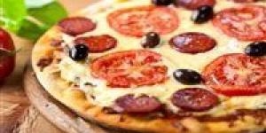 لطعم لا يقاوم ..سر العجينة المثالية للبيتزا هشه وشهية