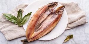 أعراض لا تتجاهلها بعد أكل الفسيخ.. متى تذهب للطبيب فورًا؟