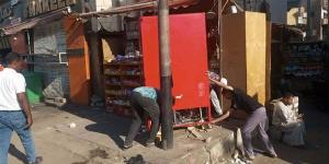 إخلاء طريق مصر أسوان الزراعي من التعديات