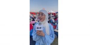 «الأجواء تحفة».. فتاة تُشيد بأكبر شاشة عرض للمونديال بالعاصمة الإدارية (فيديو)