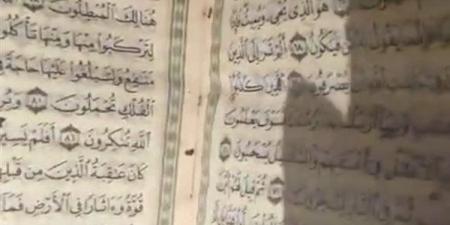 حكم وضع صورة المصحف وكتابة الآيات على كيكة المناسبات