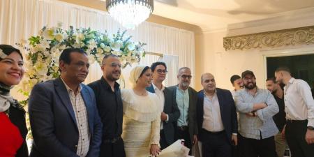 «الدستور» تهنئ الزميلين أحمد غنام وسارة الشلقاني بخطوبتهما