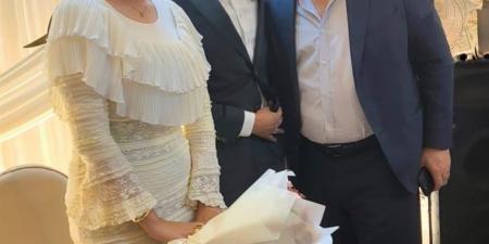 الدكتور محمد الباز يهنئ الزميلين أحمد غنام وسارة الشلقاني بخطوبتهما