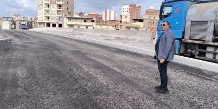 إعادة فتح كوبري مدخل مدينة كفر الدوار أمام حركة المرور