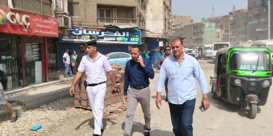 الجيزة تعيد الانضباط لشارع ناهيا ومحيط المزلقان بحي بولاق الدكرور
