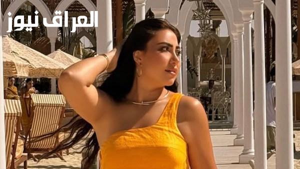 بوسي تتألق على شاطئ البحر بفستان ساحر في انتظار مشاهدتك له
